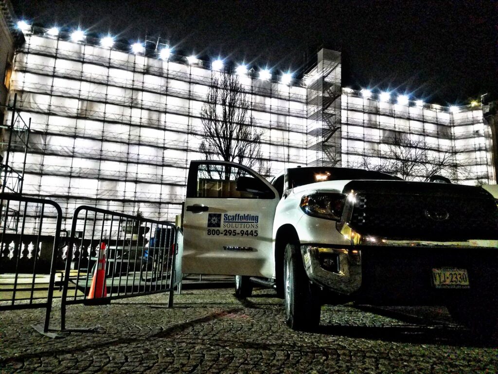 Scaffolding Solutions truck in front of the Russell Building scaffolding project