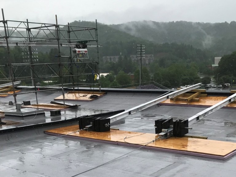 Suspended scaffolding on top of a college stadium